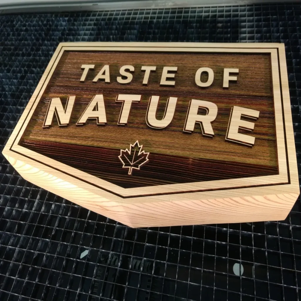Thick sandblasted sign that says taste of nature