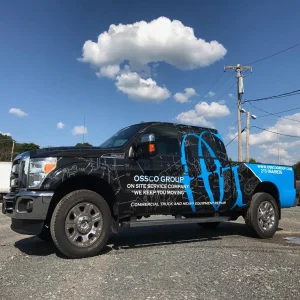 a truck with custom wrapped graphics